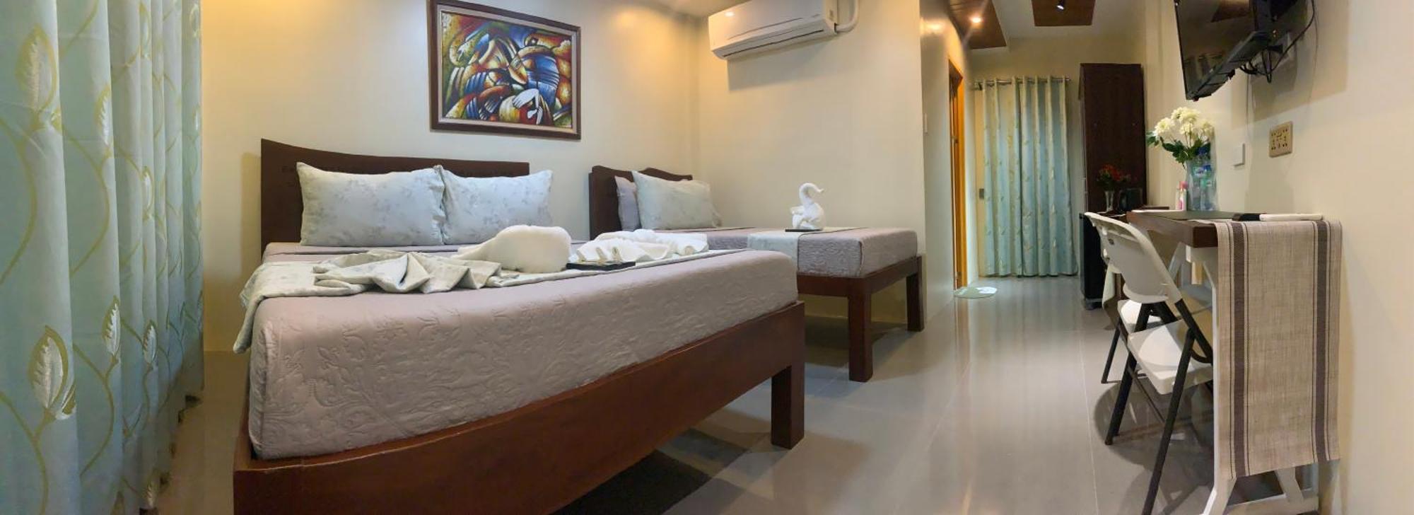 Ea Apartelle - Metro Vigan Buitenkant foto