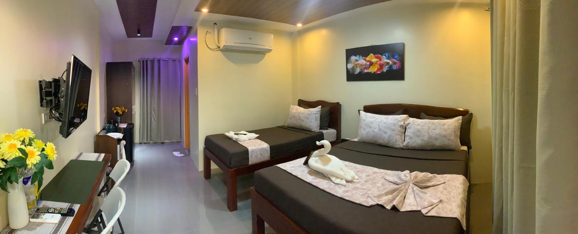Ea Apartelle - Metro Vigan Buitenkant foto