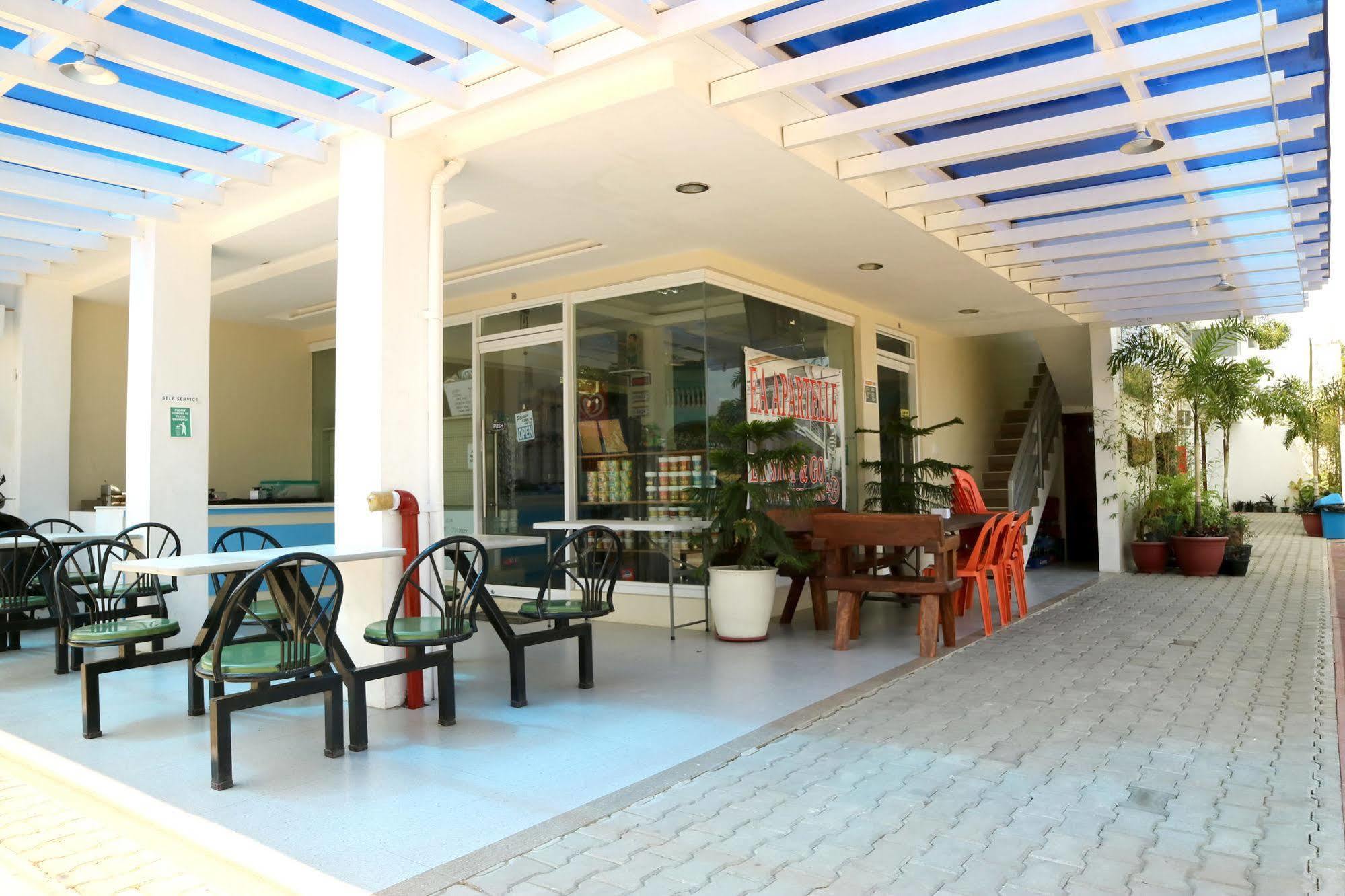 Ea Apartelle - Metro Vigan Buitenkant foto