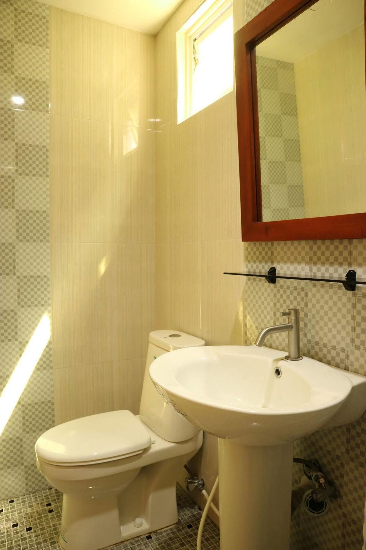 Ea Apartelle - Metro Vigan Buitenkant foto