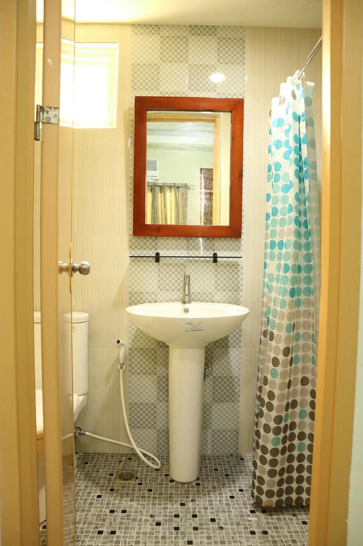 Ea Apartelle - Metro Vigan Buitenkant foto