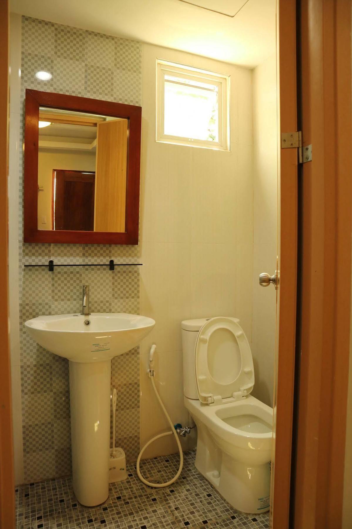 Ea Apartelle - Metro Vigan Buitenkant foto