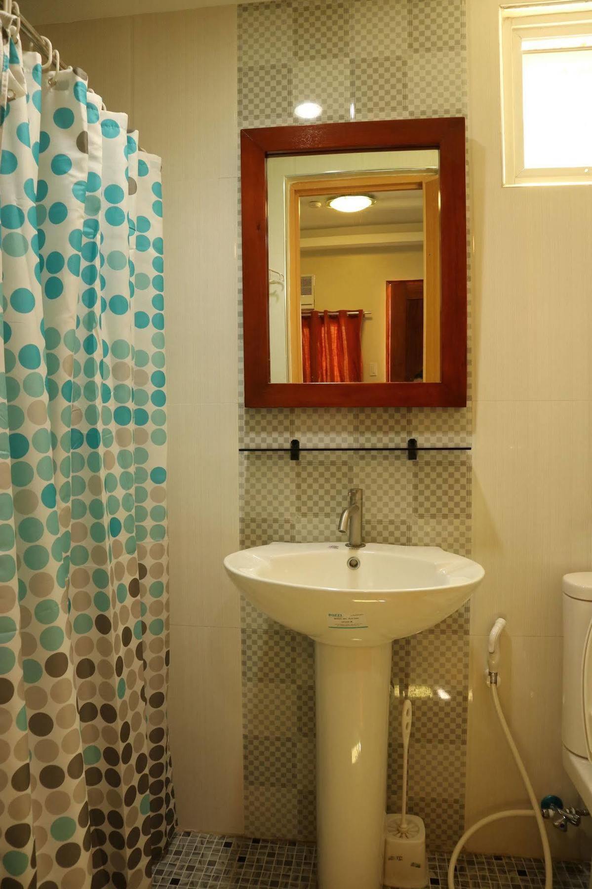 Ea Apartelle - Metro Vigan Buitenkant foto