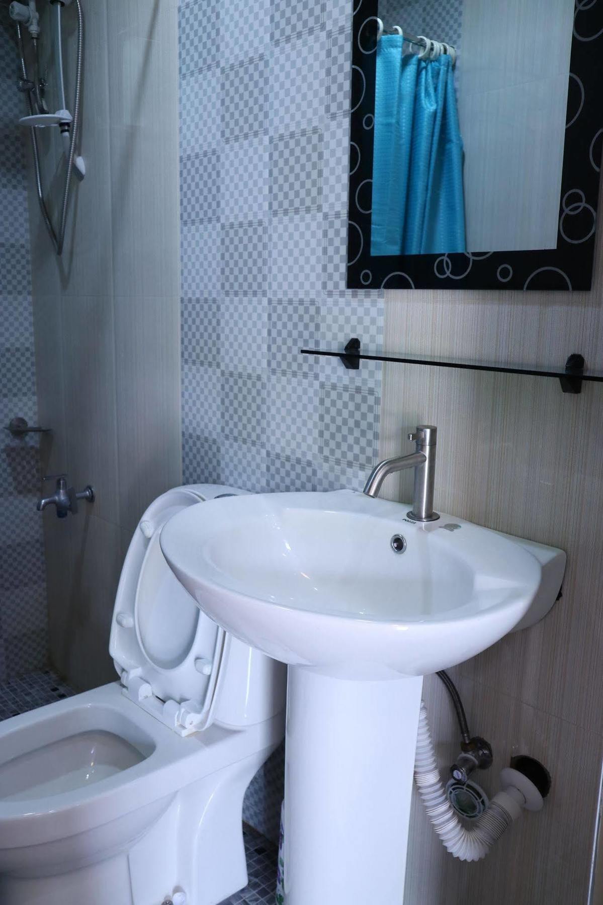 Ea Apartelle - Metro Vigan Buitenkant foto