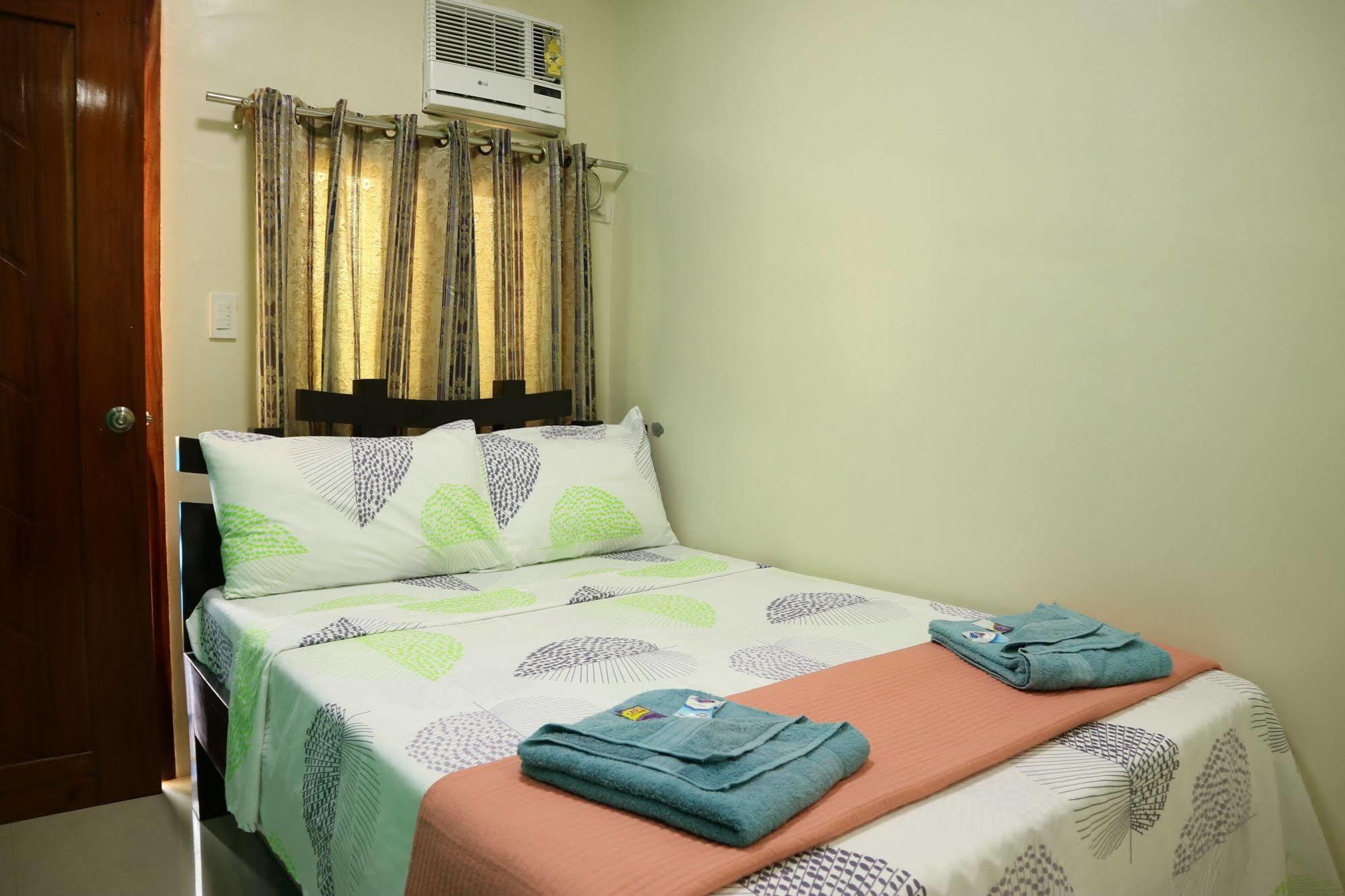 Ea Apartelle - Metro Vigan Buitenkant foto