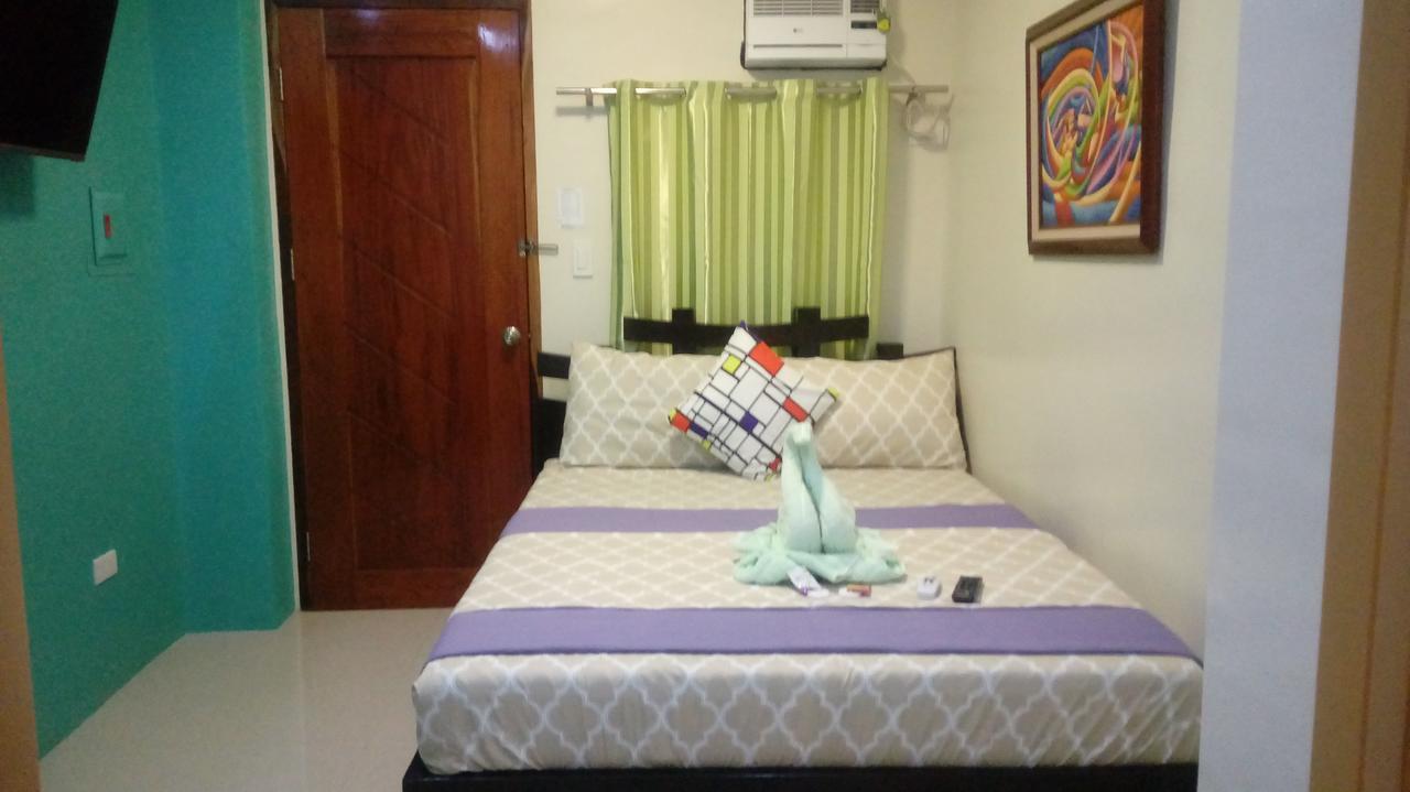 Ea Apartelle - Metro Vigan Buitenkant foto