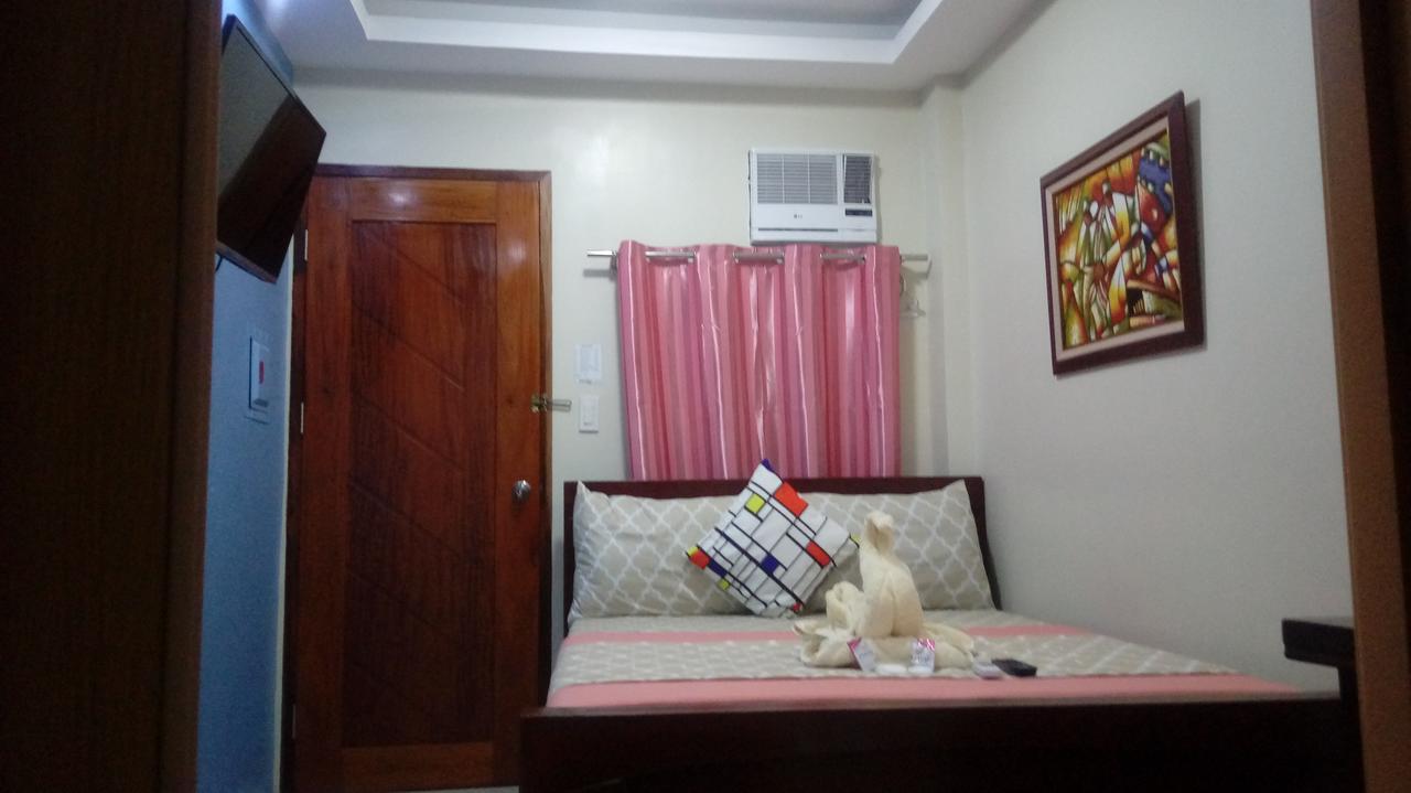 Ea Apartelle - Metro Vigan Buitenkant foto