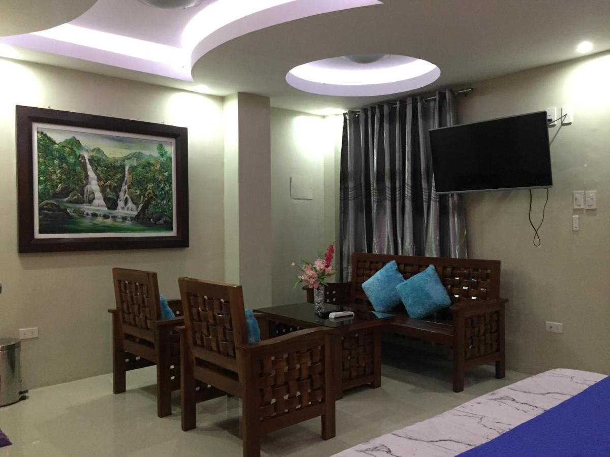 Ea Apartelle - Metro Vigan Buitenkant foto